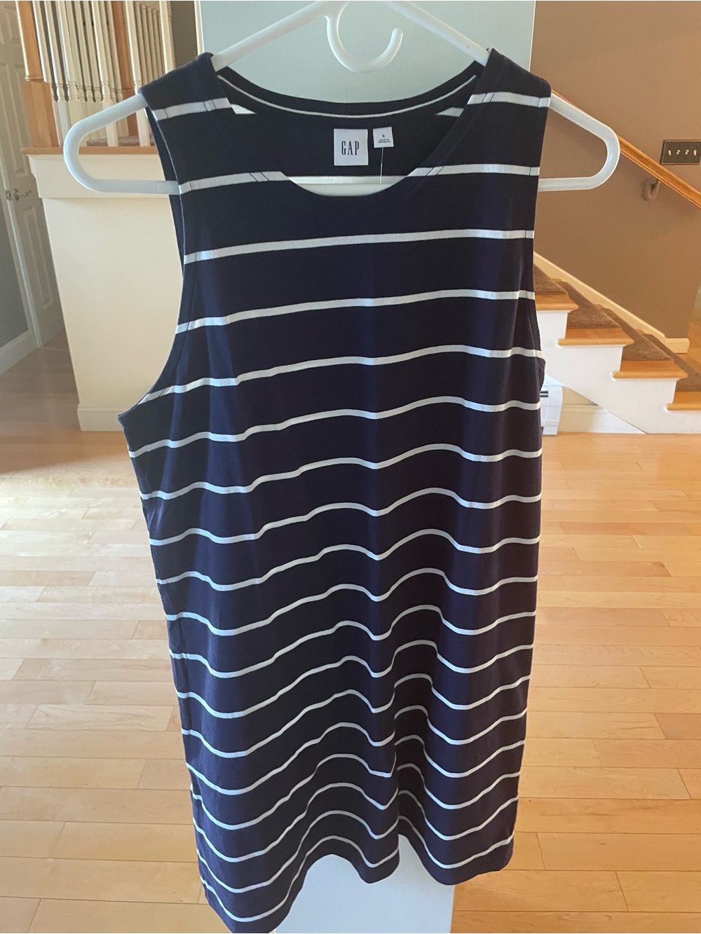 Striped navy top with tag